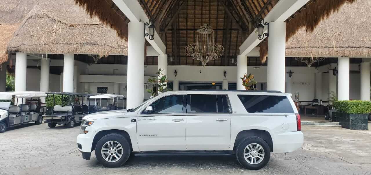 White SUV waiting for customers 