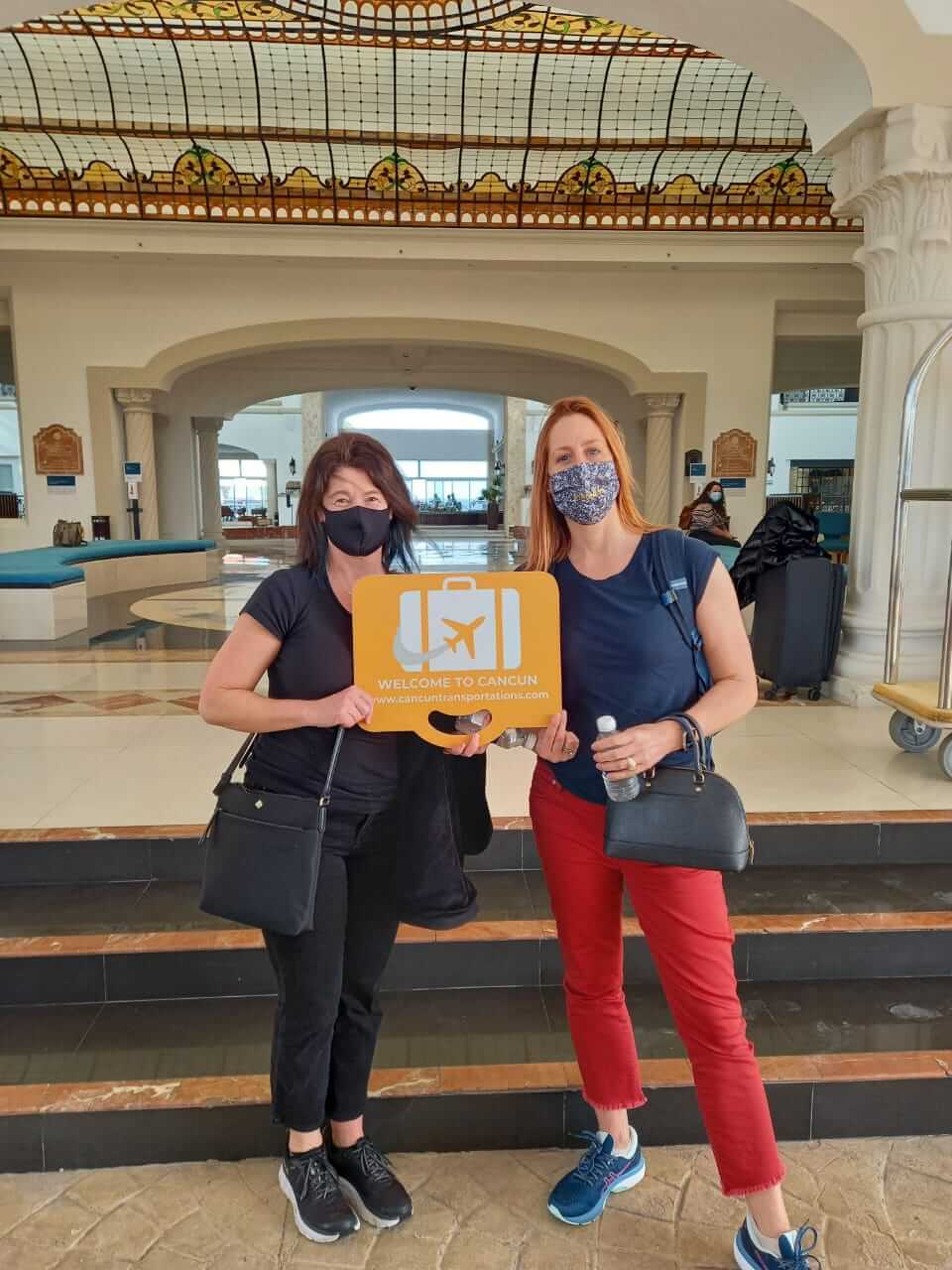 Two women arriving at their hotel