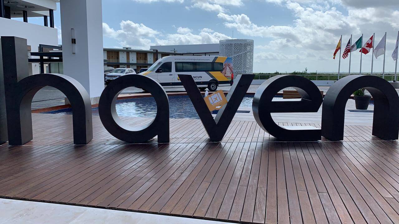 Group Transporation van parked behind Haven Resort sign