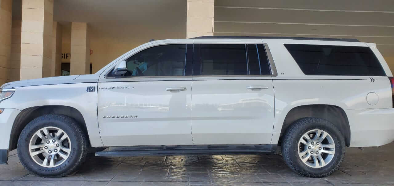 Luxury white SUV side view