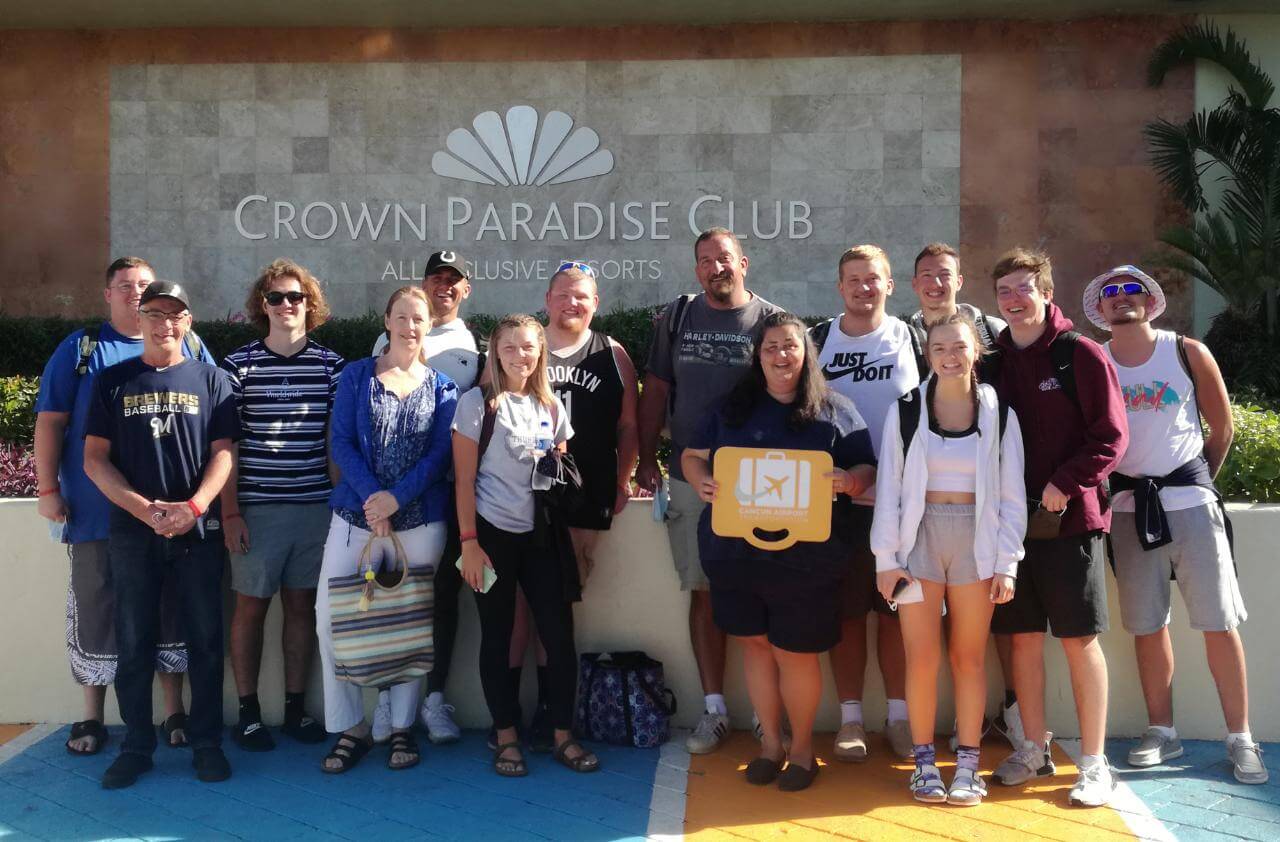 Large group of friends arriving at Crown Paradise Club Resort 