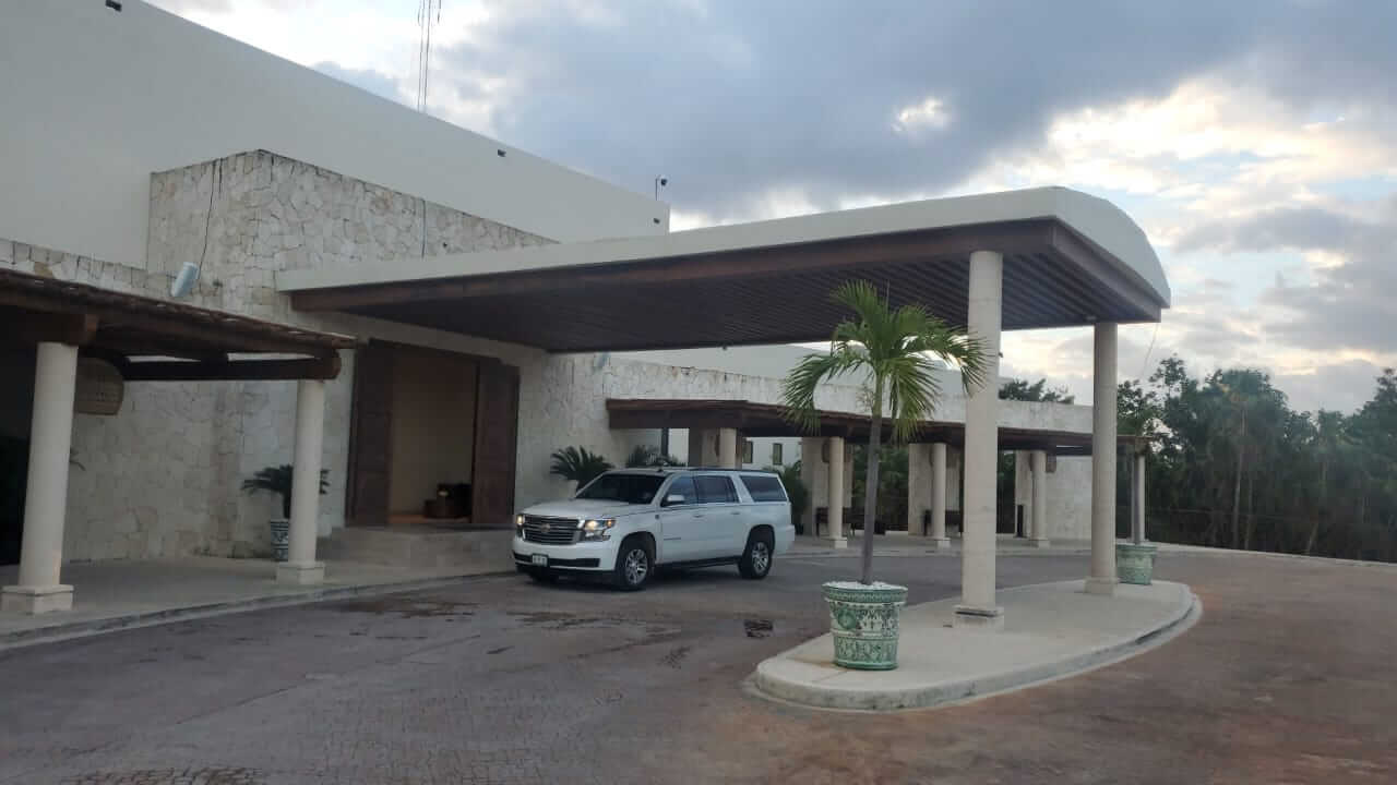 Luxury SUV waiting for customers at hotel entrance